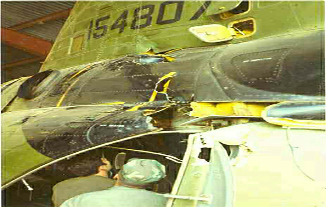 Friendly fire damage to aft pylon, H-46, during night medevac